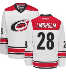Women's Reebok Carolina Hurricanes #28 Elias Lindholm Authentic White Away NHL Jersey